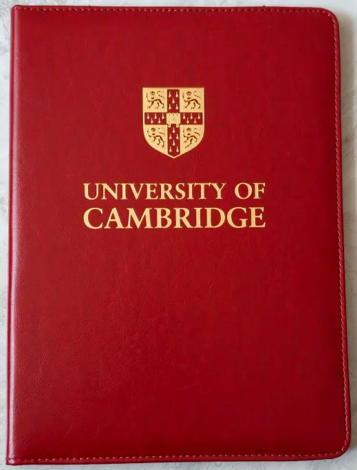 The red leather cover of the certificate from the University of Cambridge